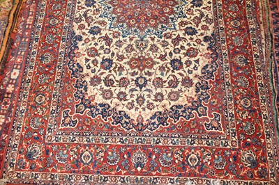 Lot 6 - * A Persian woollen Tabriz rug, the cream...