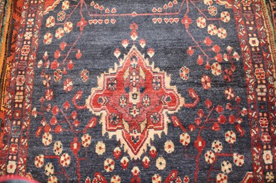 Lot 7 - * A Persian woollen rug, having a deep pile,...