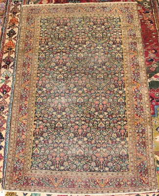 Lot 10 - * A Persian woollen Tree of Life type rug, the...