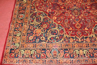 Lot 13 - * A Persian woollen Tabriz style carpet, the...