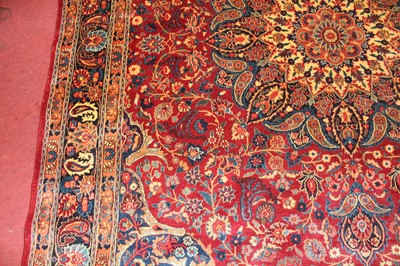 Lot 13 - * A Persian woollen Tabriz style carpet, the...