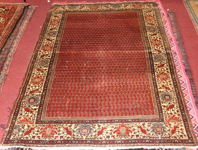 Lot 20 - * A Caucasian woollen Shirvan rug, having a...