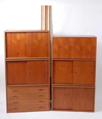 Lot 370 - An extensive 1970s teak modular wall unit,...