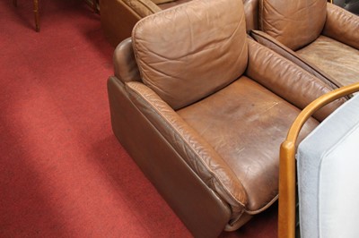 Lot 371 - De Sede - a 1960s tan leather four-piece suite,...