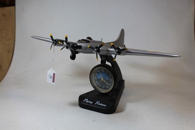 Lot 10 - An ASA Flying Fortress quartz alarm clock, in...
