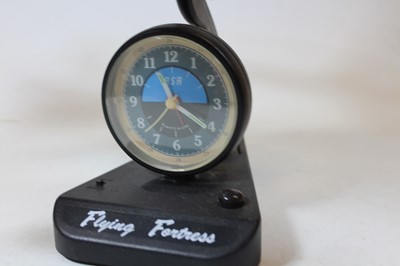 Lot 10 - An ASA Flying Fortress quartz alarm clock, in...