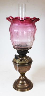 Lot 14 - A Victorian brass oil lamp, with acid etched...
