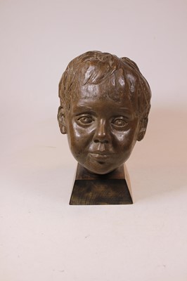 Lot 17 - A 20th century bronzed portrait bust of a boy,...