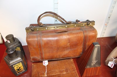 Lot 26 - A tan leather Gladstone bag; together with a...