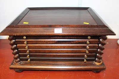 Lot 45 - A 20th century stained beech coin collector's...