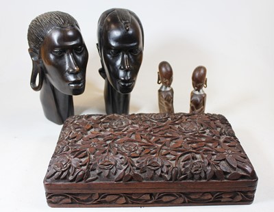 Lot 50 - A pair of 20th century African carved hardwood...