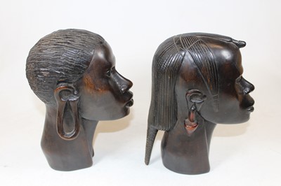 Lot 50 - A pair of 20th century African carved hardwood...