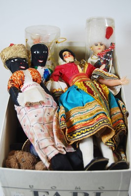 Lot 58 - A box containing a collection of various dolls...
