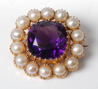 Lot 2546 - A yellow metal, amethyst and seed pearl...