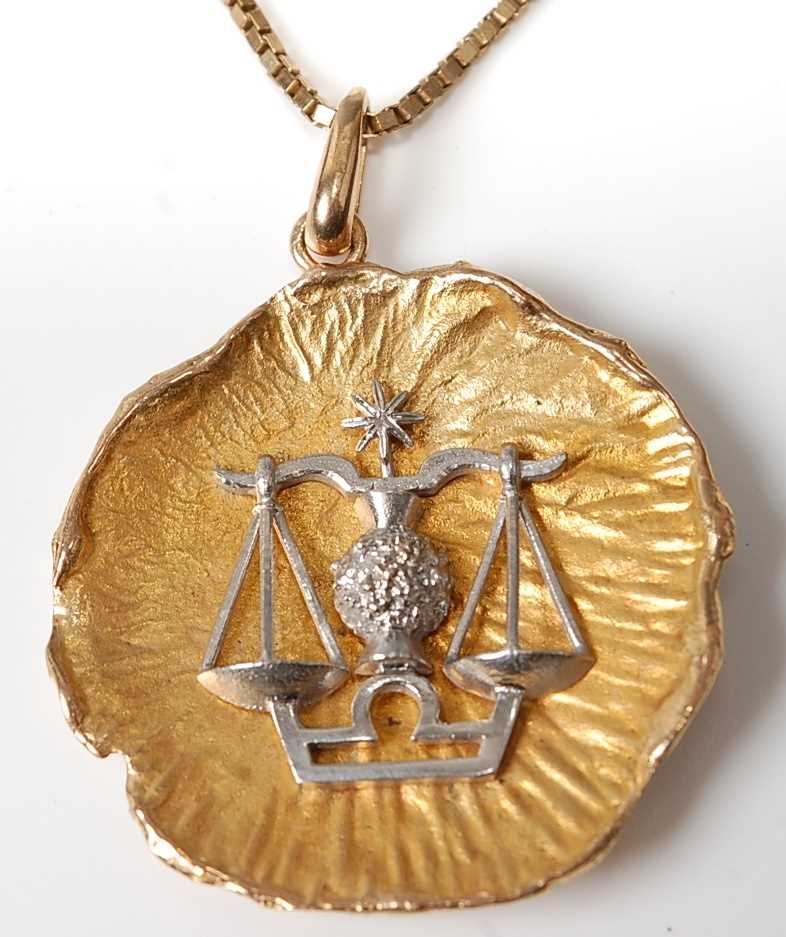 Lot 2548 - A yellow metal Masonic pendant in the form of...