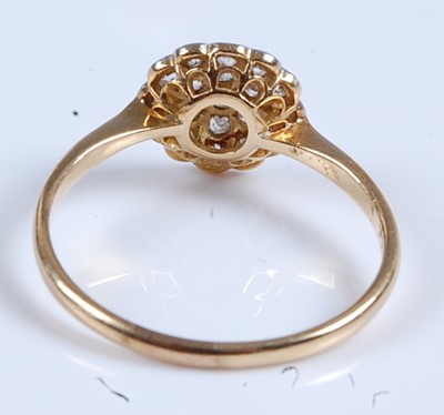 Lot 2557 - A yellow and white metal diamond circular...