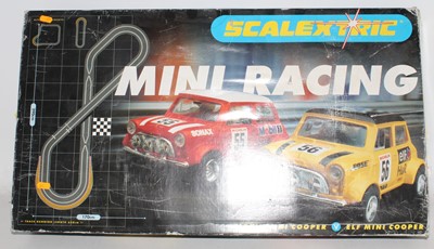 Lot 805 - Scalextric Mini Racing set, has been open but...