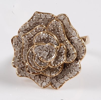 Lot 2556 - A 9ct yellow gold diamond cluster ring in the...