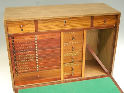 Lot 2251 - A modern teak coin collectors cabinet, the...