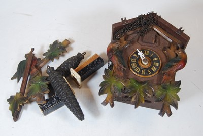 Lot 72 - A 20th century Swiss carved pine cuckoo clock