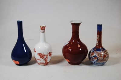 Lot 87 - A collection of four Chinese export bottle...
