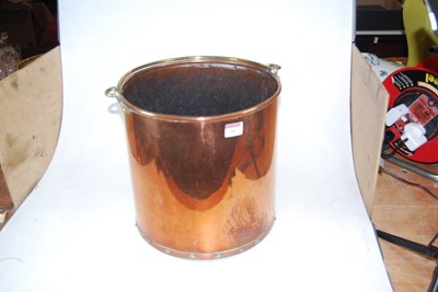 Lot 86 - A 20th century riveted copper and brass coal...