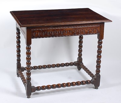 Lot 1425 - A circa 1700 joined oak side table, the...