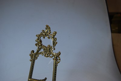 Lot 94 - A 19th century miniature brass easel,...