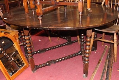 Lot 1454 - A Charles II and later oak gateleg table, the...