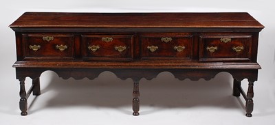 Lot 1455 - An 18th century oak dresser base, the...