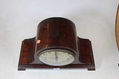Lot 23 - A 1920s mahogany cased mantel clock, having a...