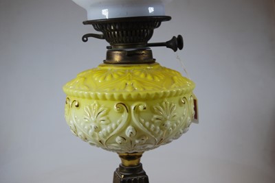 Lot 103 - A late Victorian oil lamp, having an...