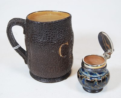 Lot 167 - A Doulton Lambeth stoneware Jack, with faux...