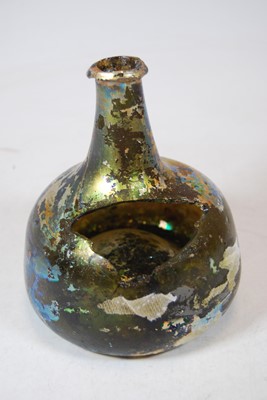 Lot 171 - A Roman iridescent glass bottle, of mallet...