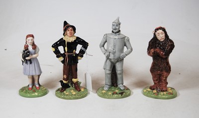 Lot 183 - A set of four Royal Doulton Wizard of Oz...