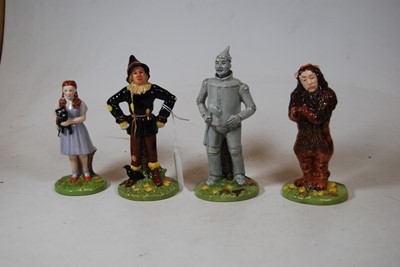 Lot 183 - A set of four Royal Doulton Wizard of Oz...