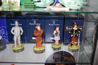 Lot 151 - A set of four Royal Doulton Wizard of Oz...