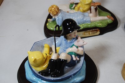 Lot 189 - A collection of four Royal Doulton Winnie the...