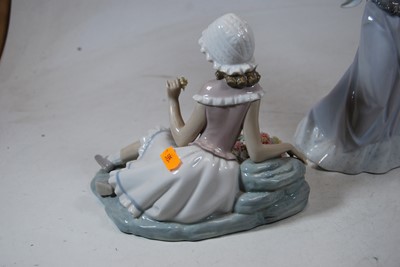 Lot 196 - A Lladro Spanish porcelain figure of a girl...