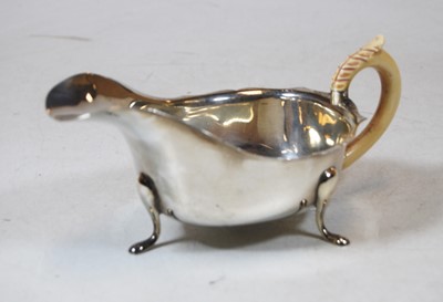 Lot 206 - An early 20th century silver sauceboat, of...