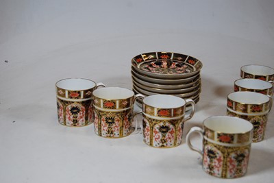 Lot 220 - A set of seven Royal Crown Derby bone china...