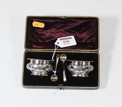 Lot 216 - A pair of George V silver open salts, having...