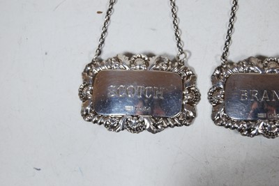 Lot 250 - A pair of modern silver decanter collars, for...