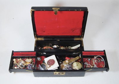 Lot 285 - A leather clad jewellery box and contents, to...