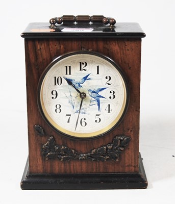 Lot 289 - A late Victorian walnut cased mantel clock,...