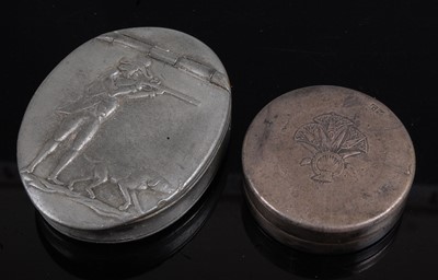 Lot 2511 - A pewter snuff box of oval form, the hinged...