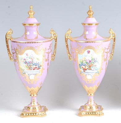Lot 1063 - A pair of Lynton Porcelain Co pedestal vases...