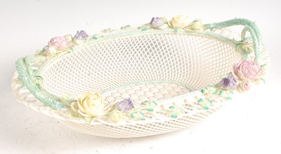 Lot 1081 - A first period Belleek porcelain basket, the...