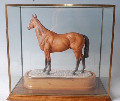 Lot 1042 - A Royal Worcester model of Arkle, modelled by...