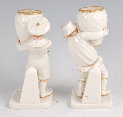 Lot 1034 - A pair of Hadley Worcester figures in the Kate...